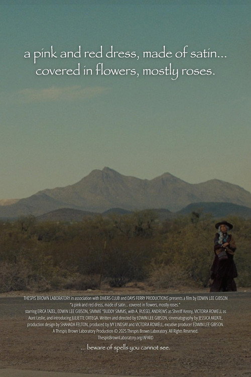a pink and red dress, made of satin… covered in flowers, mostly roses
